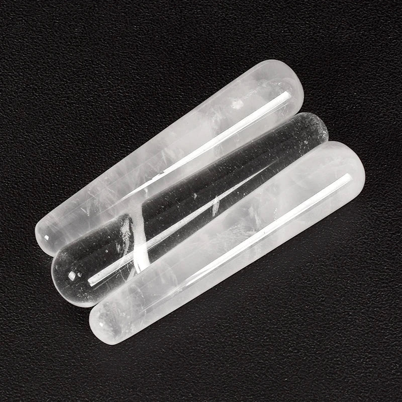 Crystal face massager made of rose quartz for skincare and relaxation.