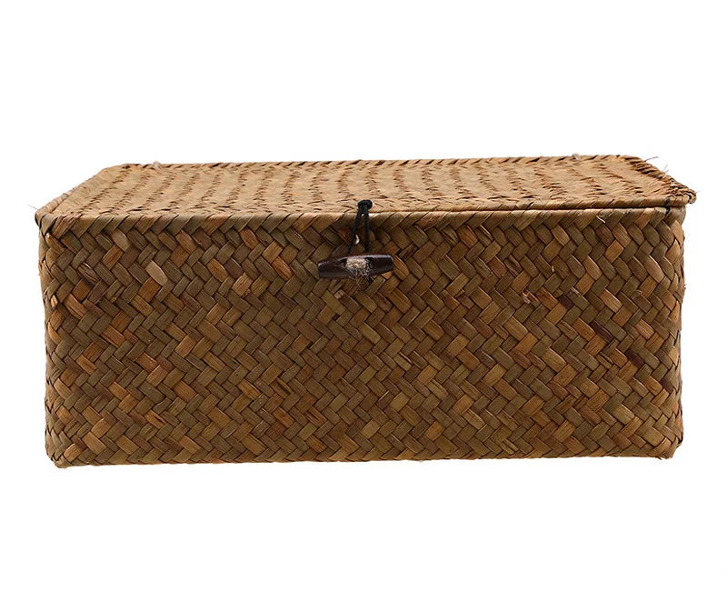 Rectangular desktop storage box made of hand-woven rattan wicker for organizing sundries.