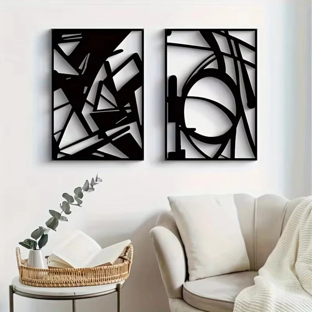 Minimalist abstract metal wall art sculptures on a stylish living room wall.