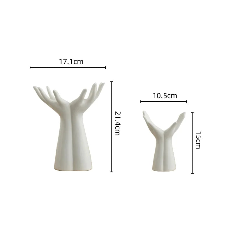 Modern ceramic vase shaped like hands, ideal for bouquets and home decoration.