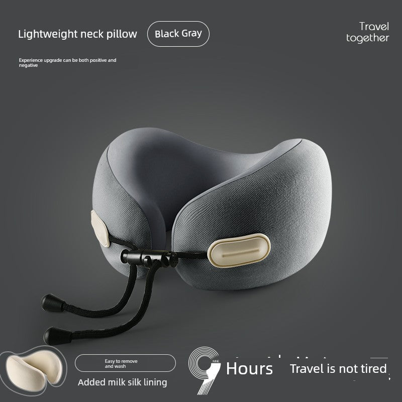 U-shaped travel pillow in black gray with memory cotton and retractable folding design for neck support on aircraft.