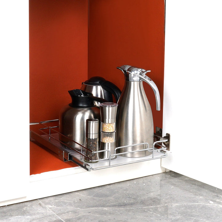 Modern pull-out cabinet organizer with multiple storage compartments in a kitchen setting