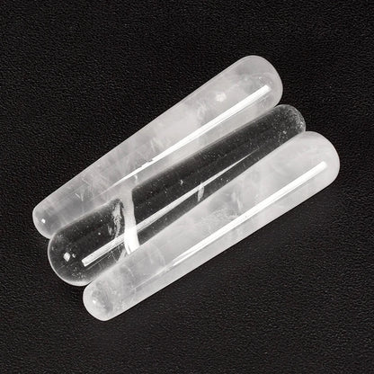 Crystal face massager made of rose quartz for skincare and relaxation.