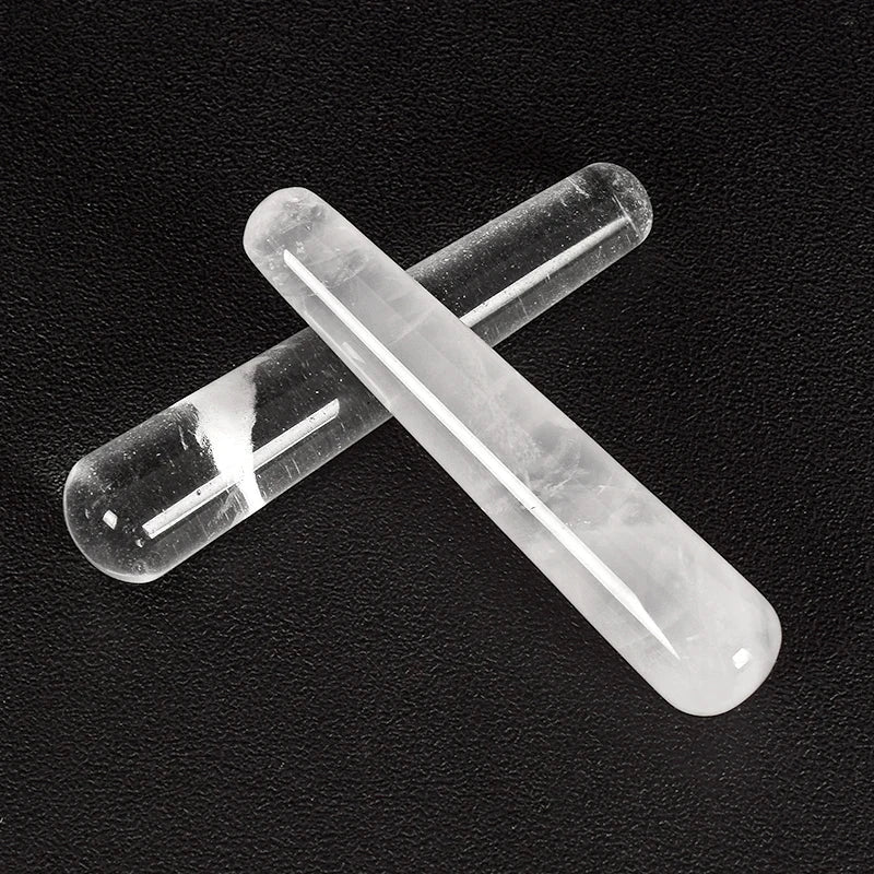 Natural rose quartz crystal face massager for facial relaxation and skin care.
