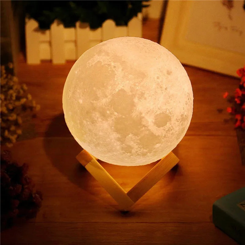 3D moon lamp glowing on a wooden stand, illuminating a room with soft white light.