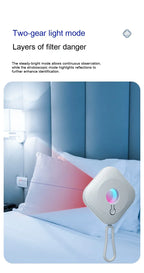 Smart Mini Camera Detector scanning a hotel bed for hidden cameras with two-gear light mode features