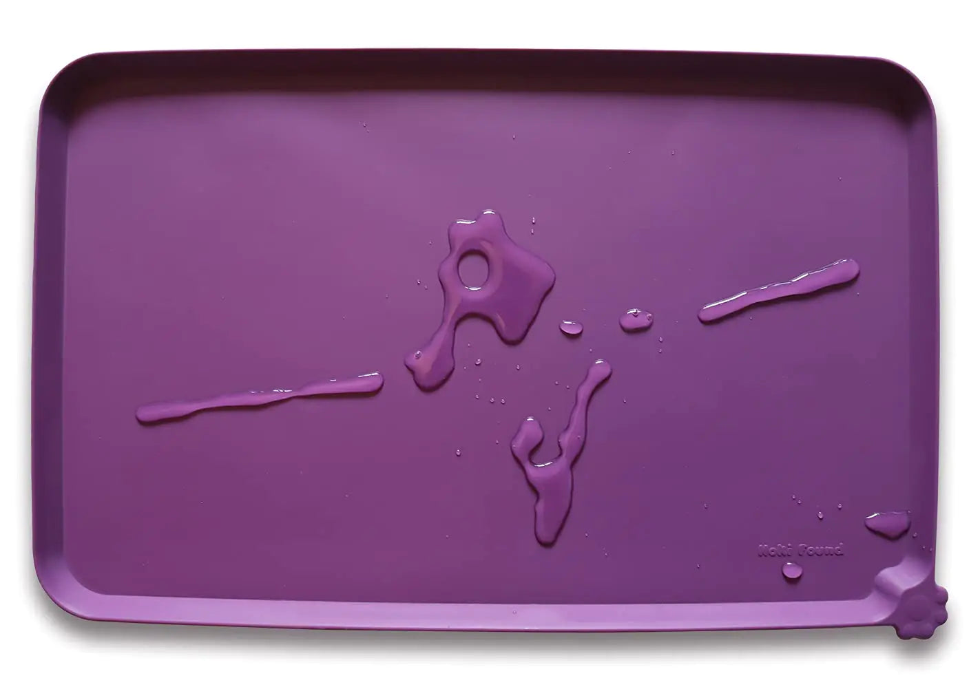 Hoki Found silicone pet food mat in eggplant purple with water droplets, non-slip and waterproof placemat for dog and cat feeding.