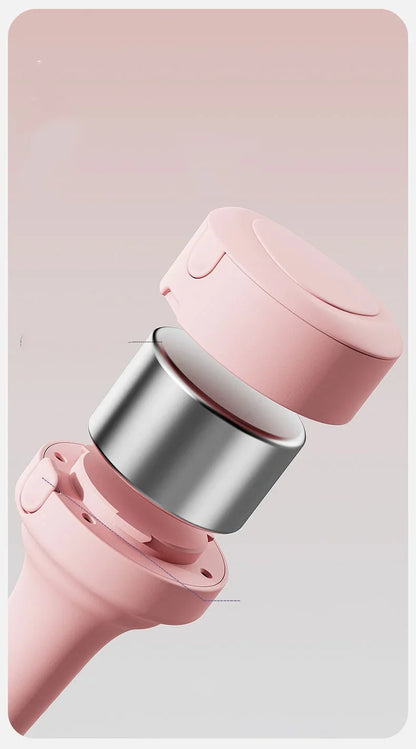 Adjustable rubber-covered dumbbell with pink spray-paint finish for strength training.