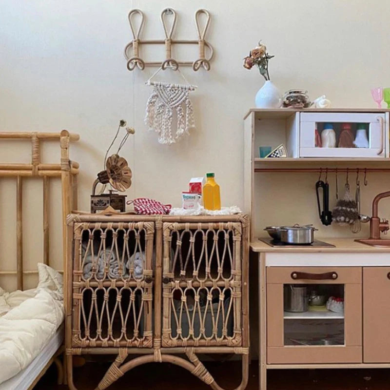 Rattan wall hooks for kids' room storage and decoration.