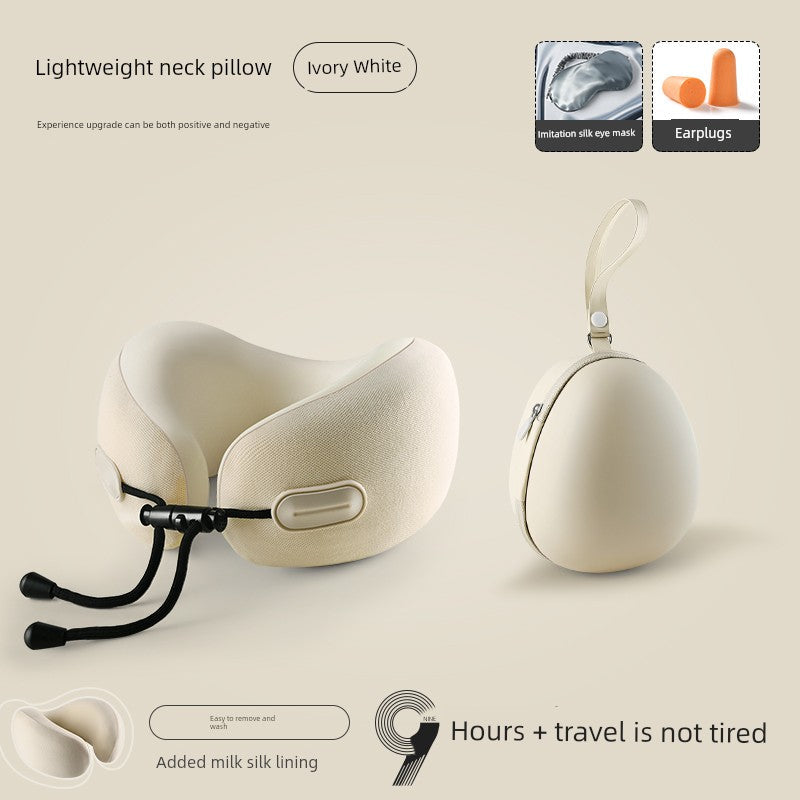 Ivory white U-shaped travel pillow with memory foam, retractable design, and neck support.