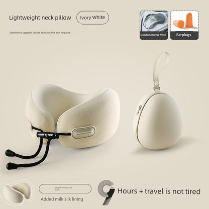 Ivory white U-shaped travel pillow with memory foam, retractable design, and neck support.
