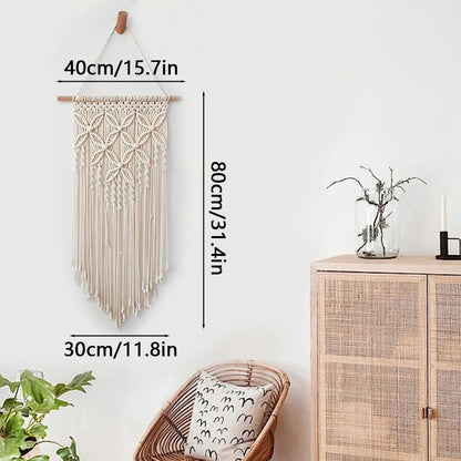 Macrame wall hanging tapestry with tassel crochet decoration in a living room setting.