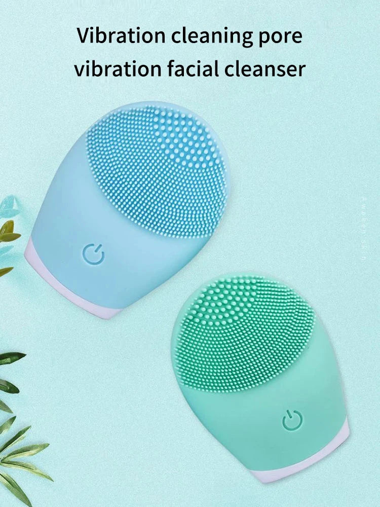 Electric facial cleansing brush with vibration cleaning feature in blue and green colors.