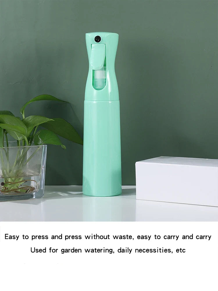 High pressure spray bottle in light green color, 300ml capacity, designed for versatile use in skincare and nail care.