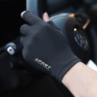 Unisex ice silk cycling gloves in black worn while driving.