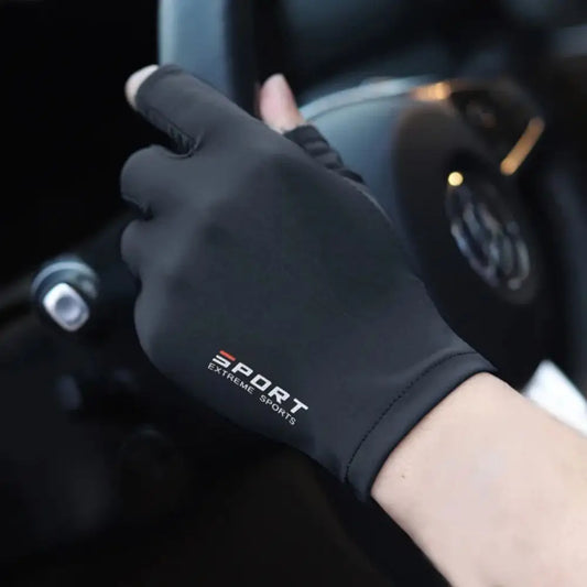 Unisex ice silk cycling gloves in black worn while driving.