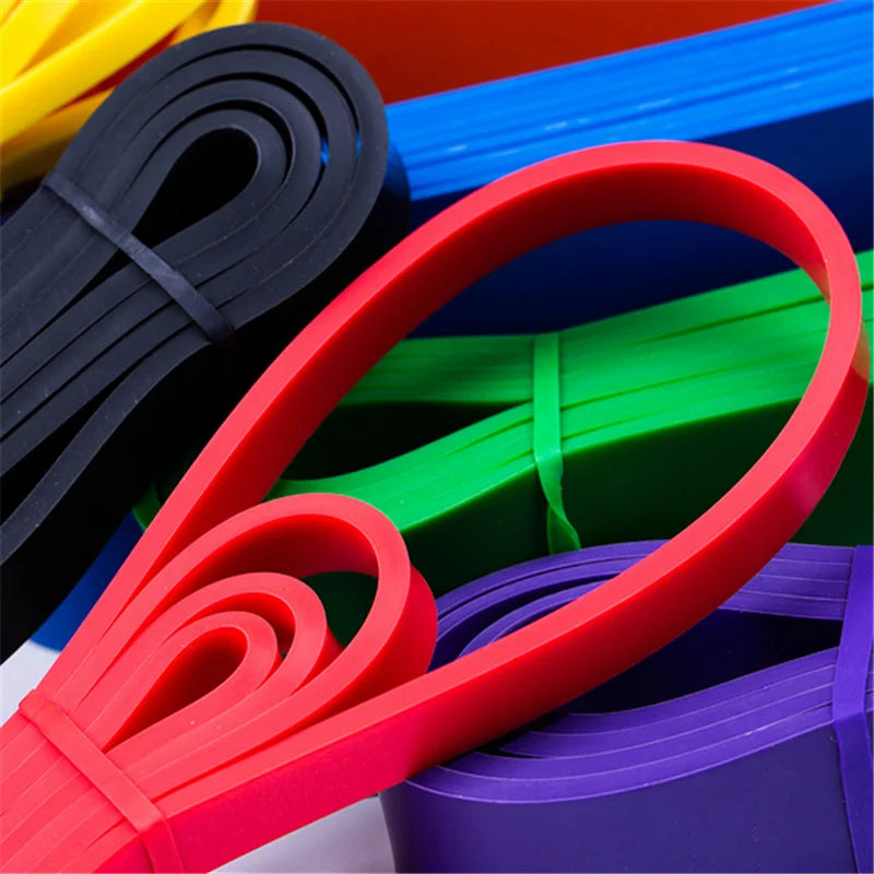 Colorful resistance bands set for fitness and bodybuilding exercises.