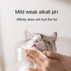 Pet wipes gently cleaning a cat's face with mild pH formula.