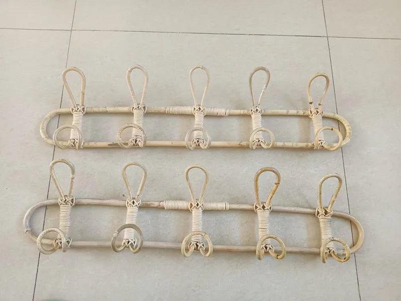 Rattan wall hooks for children's room organization.