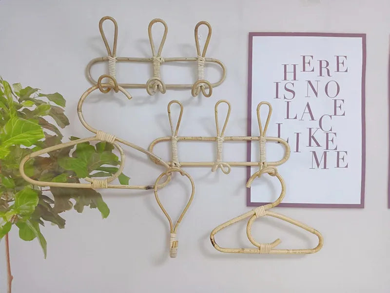 Rattan wall hooks for kids' room decor, featuring natural rattan design and multiple hooks.