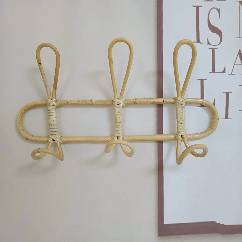 Rattan wall hooks for kids' room organization and decoration.