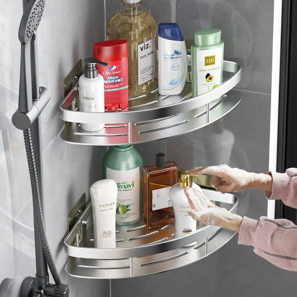Corner shower shelf with multiple bottles, installed on a wall without drilling.