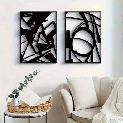 Minimalist abstract metal wall art sculptures on a stylish living room wall.