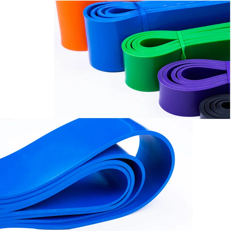 Resistance bands set in various colors for fitness and muscle relaxation training.