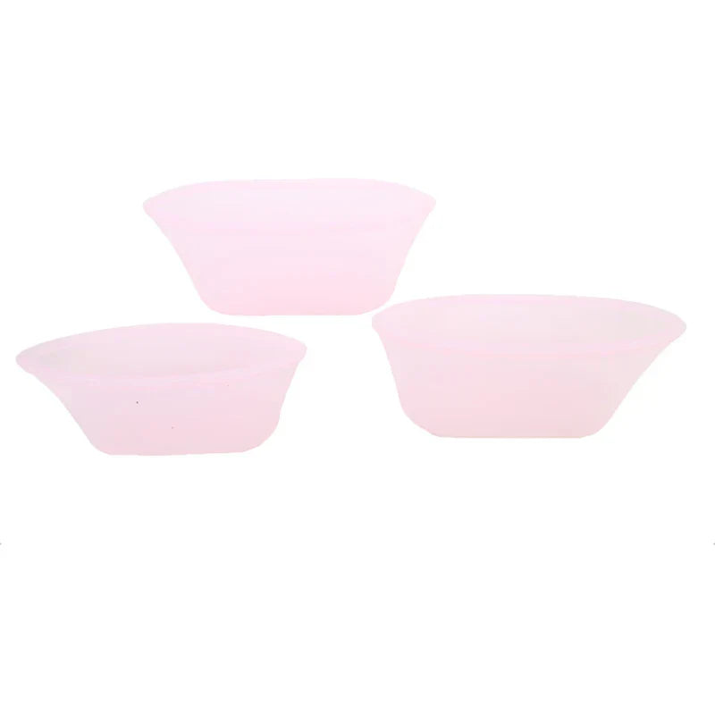 3-piece set of reusable silicone food storage bags in pink.