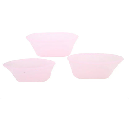3-piece set of reusable silicone food storage bags in pink.