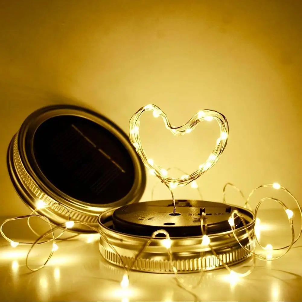Solar mason jar lights with warm white LED, energy-efficient, eco-friendly, ideal for garden or terrace decoration.