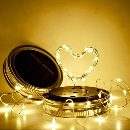 Solar mason jar lights with warm white LED, energy-efficient, eco-friendly, ideal for garden or terrace decoration.