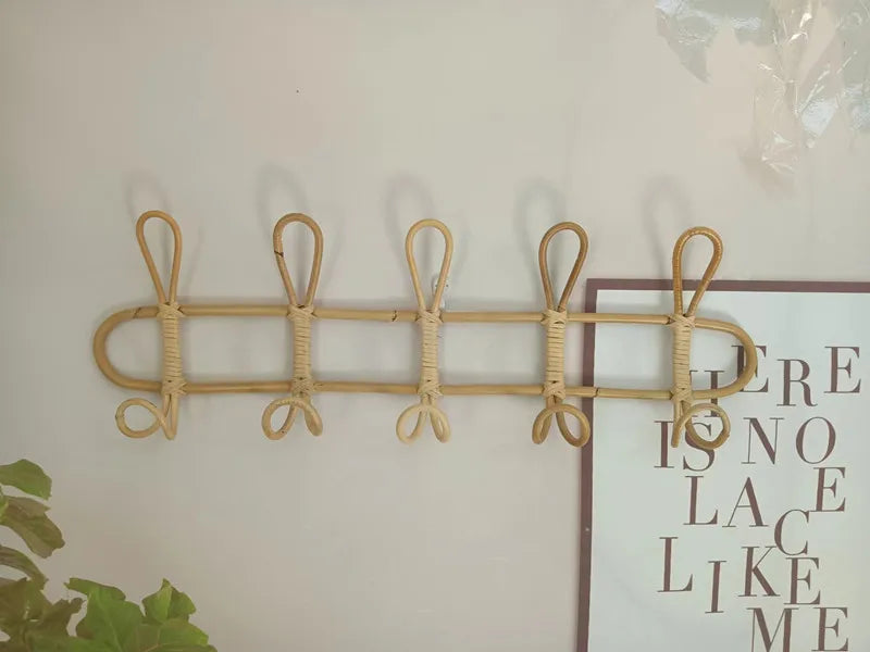 Rattan wall hooks for children's room, natural rattan design for clothes and hats, eco-friendly storage solution.