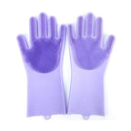 Pet grooming gloves made of soft silicone for gentle hair removal and massage.