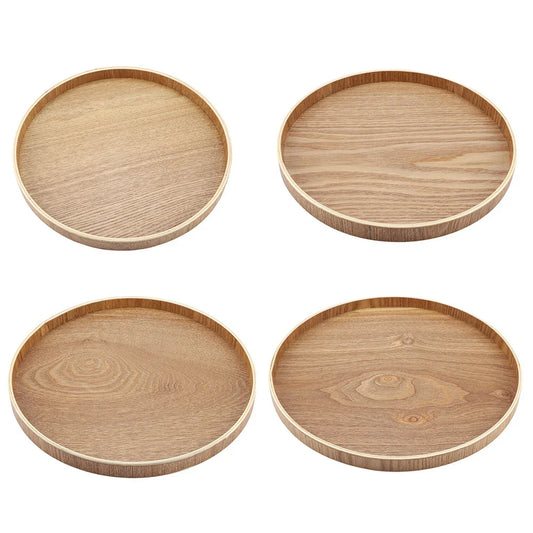 Wooden serving trays in round shapes, ideal for tea, fruits, and home decoration.