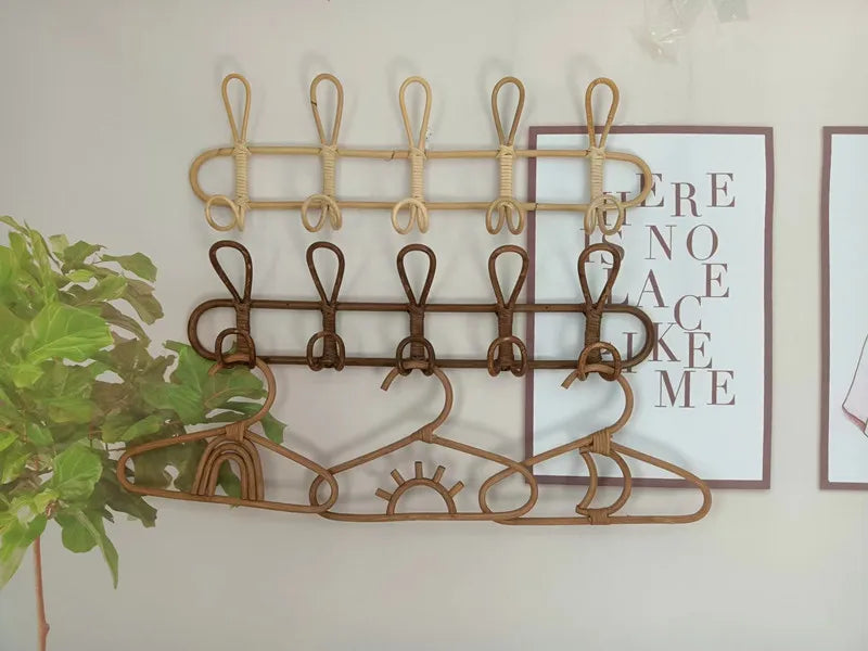 Rattan wall hooks for children's room, natural and eco-friendly storage solution.