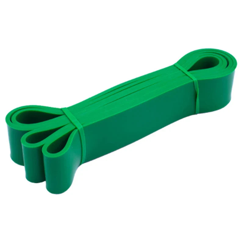 Green resistance band set for fitness training and bodybuilding exercises.