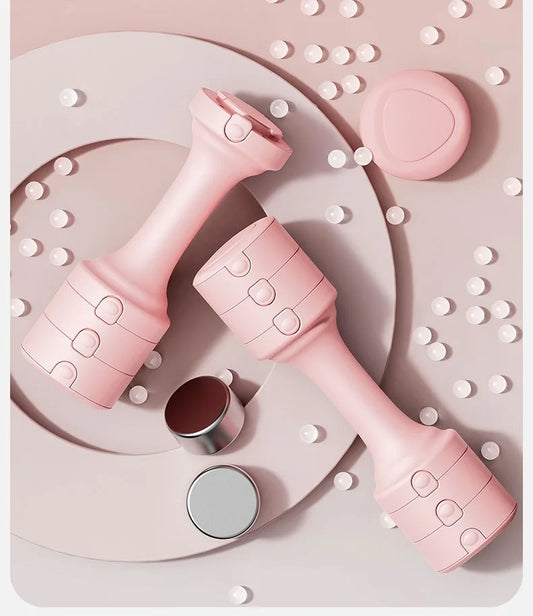 Pink adjustable dumbbells with a rubber cover designed for strength training.