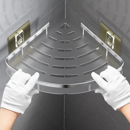 Corner no-drill shower shelf made of stainless steel for bathroom storage, wall-mounted.