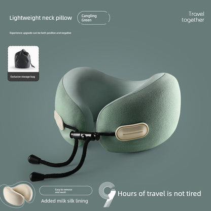 U-shaped travel pillow made of memory cotton with retractable folding design, solid green color, ideal for aircraft use.