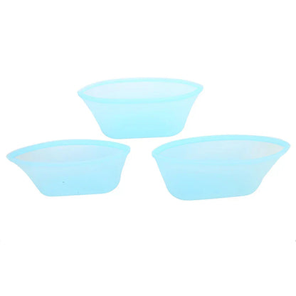 3-piece set of reusable silicone food storage bags in blue.