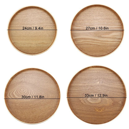 Wooden serving tray set in round design with different sizes labeled: 24cm, 27cm, 30cm, and 33cm.