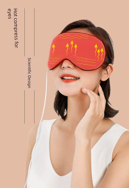 USB heated eye mask promoting eye blood circulation, featuring steam technology, worn by a model in a relaxed pose.