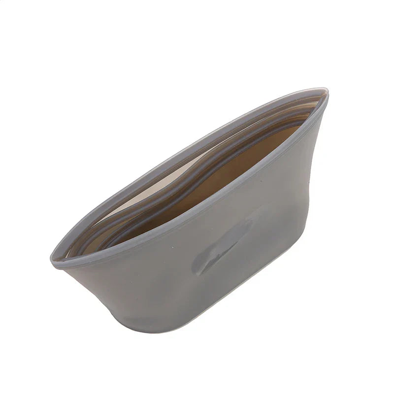 Reusable silicone food storage bag in gray color.