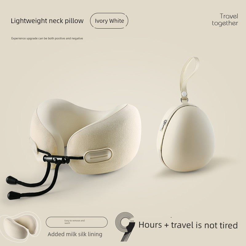 Ivory white U-shaped travel pillow with memory foam, designed for adult neck support, featuring retractable folding for easy transport.
