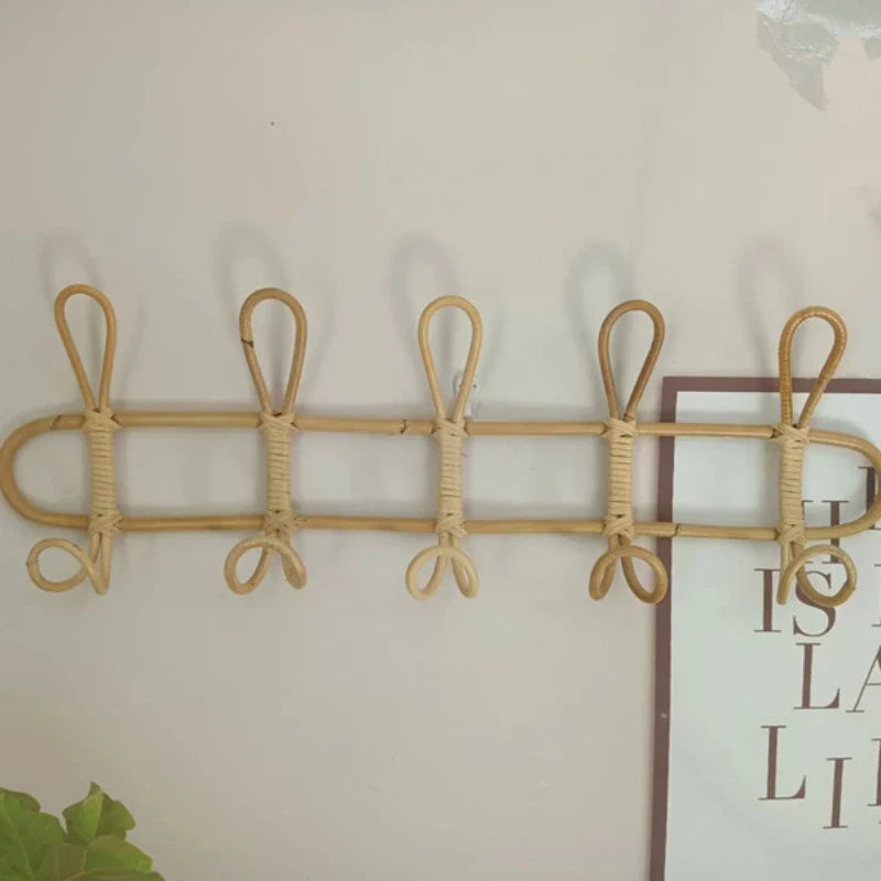 Rattan wall hooks for children's room décor.