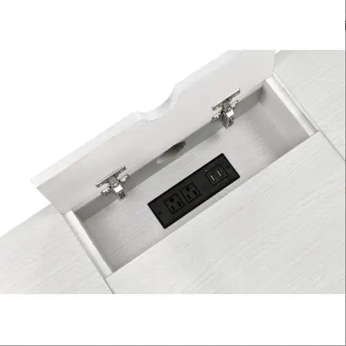 Built-in USB port and power outlets inside white wood writing desk compartment