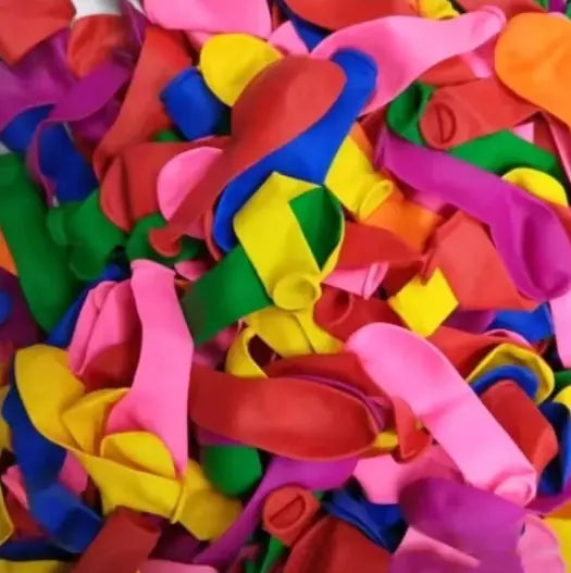colorful deflated balloons piled together for play activities